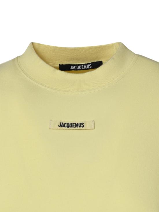26FW 자크뮈스 그로그랭 로고 롱슬리브 티셔츠 TSW00155AJ00124 205 PALE YELLOW - JACQUEMUS