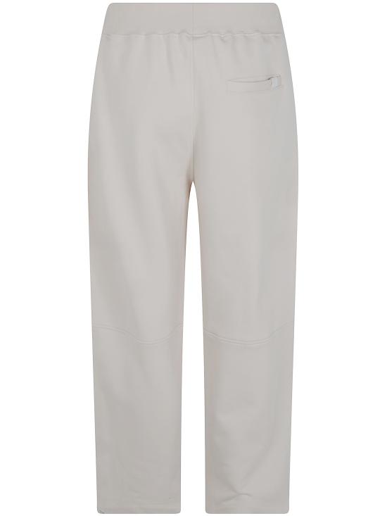 26FW 더블유오씨 트레이닝/조거 팬츠 126PA204FL IVORY - WOC