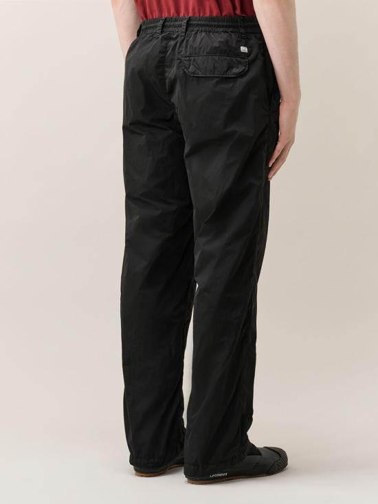 27FW 씨피 컴퍼니 팬츠 21CMPA109A005904G 999 BLACK - C.P. COMPANY