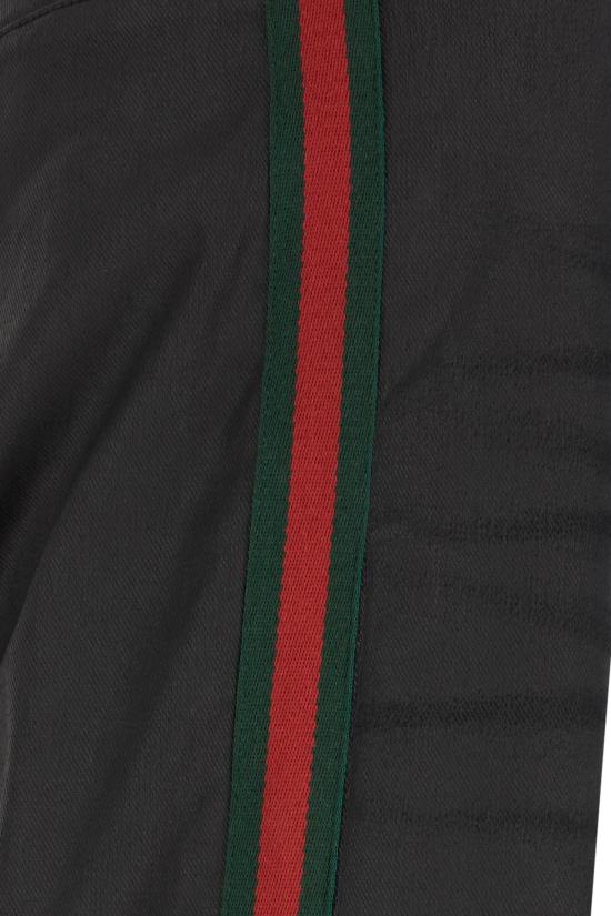 26FW 구찌 웹 디테일 코팅 코튼 트윌 데님 팬츠 A006GGXDDH3 1000 Black - GUCCI